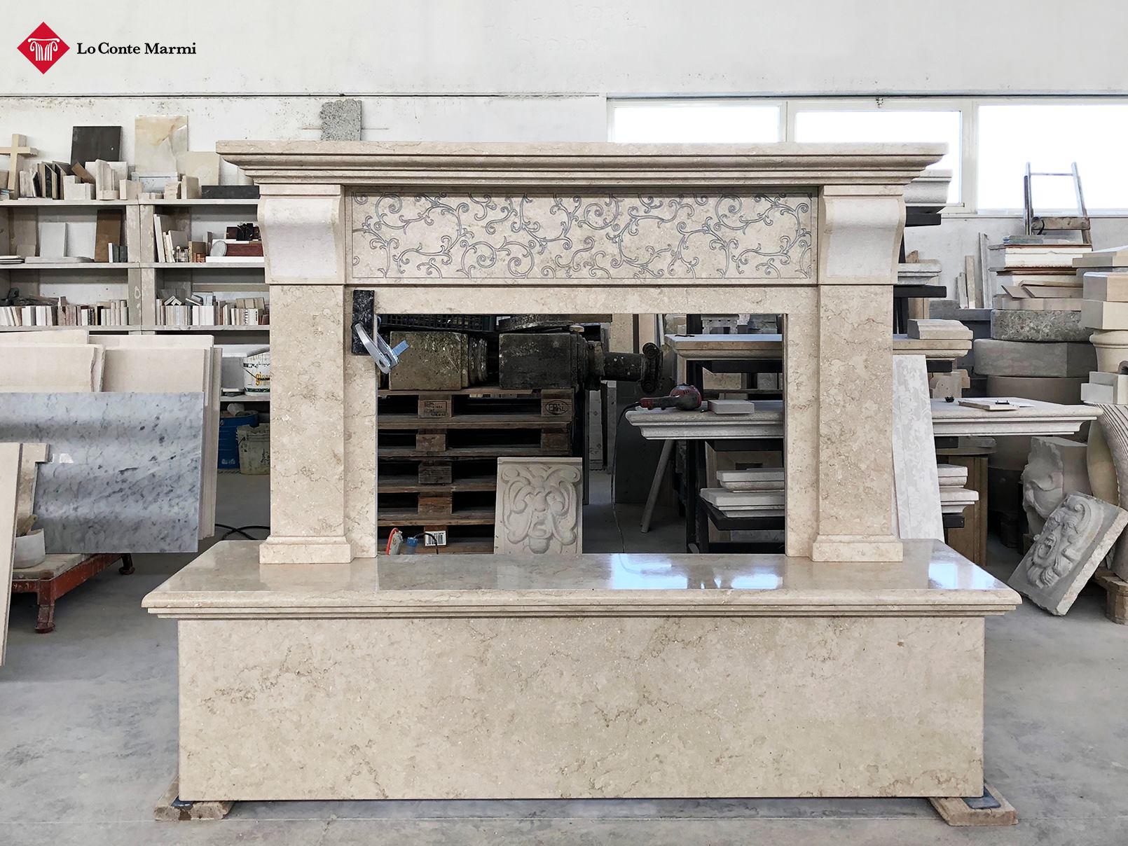 Marble fireplace cladding with decoration